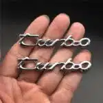 آرم فلزی روی گلگیر توربو استیل ۲ عددی