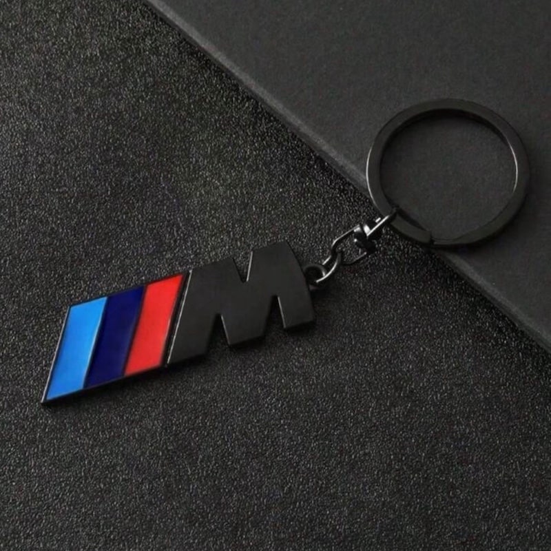 جاسوییچی سرکلیدی فلزی طرح M3 مشکی-۲ جاسوییچی سرکلیدی فلزی طرح M3 مشکی